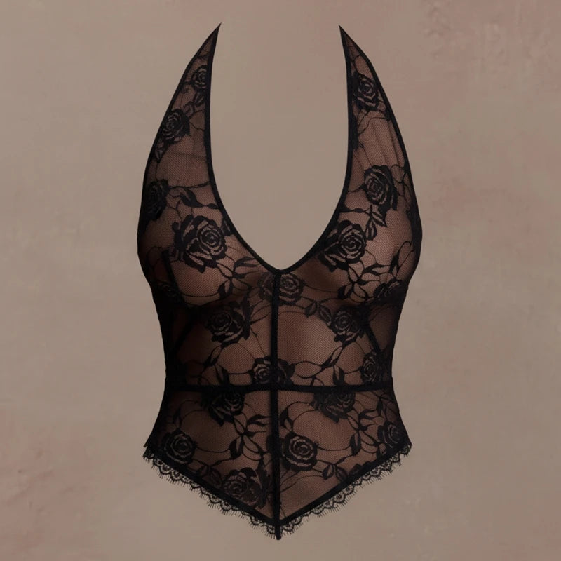 Black lace lingerie set on a beige background