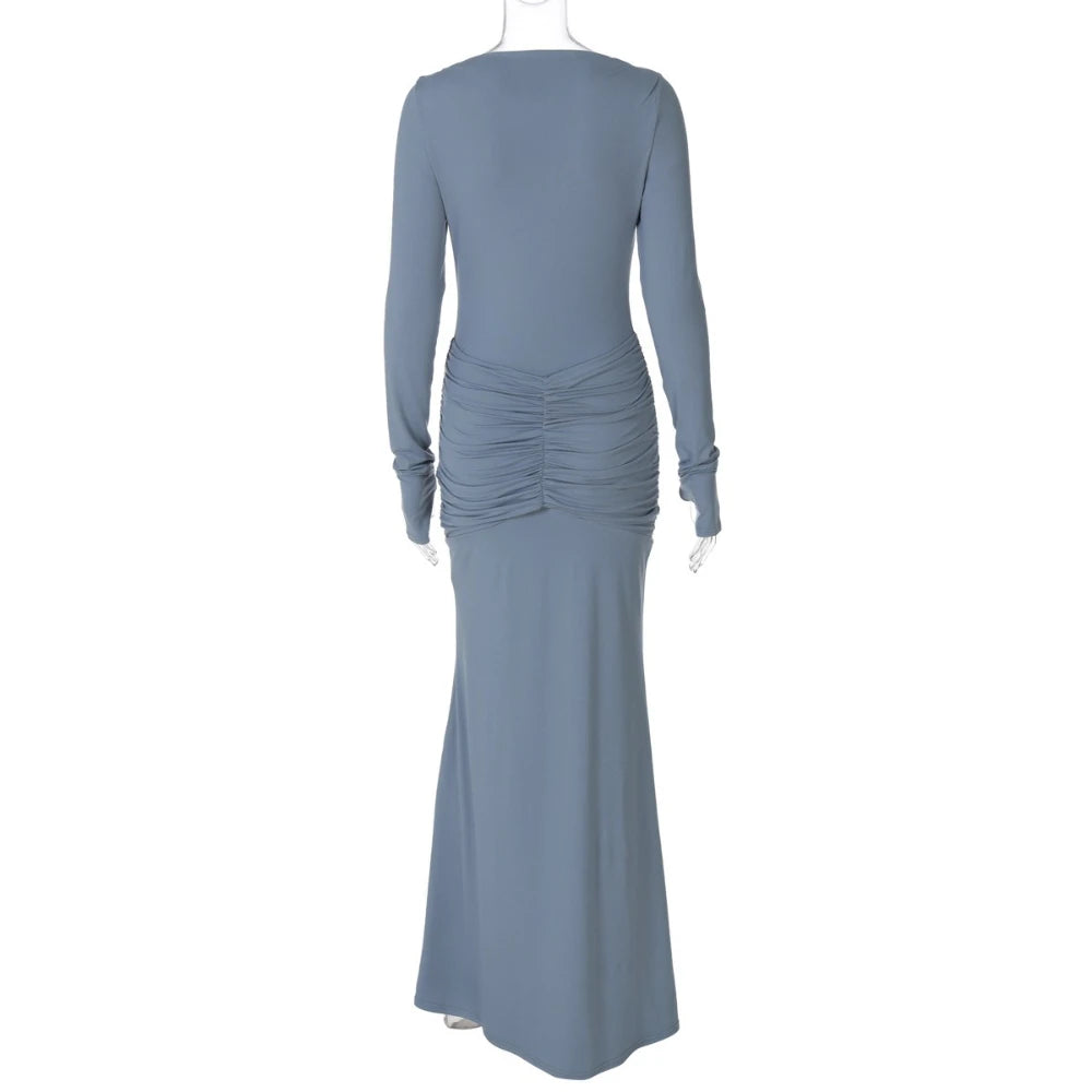 Blue evening gown with ruched detailing on a white background