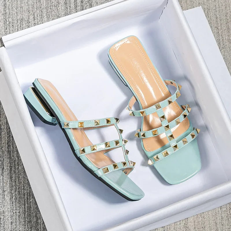Blue studded block heel slide sandals