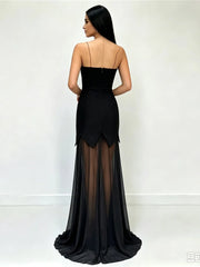 Back view of black strapless top and maxi skirt two-piece set