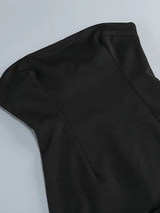 Close-up of black fabric on a light gray background