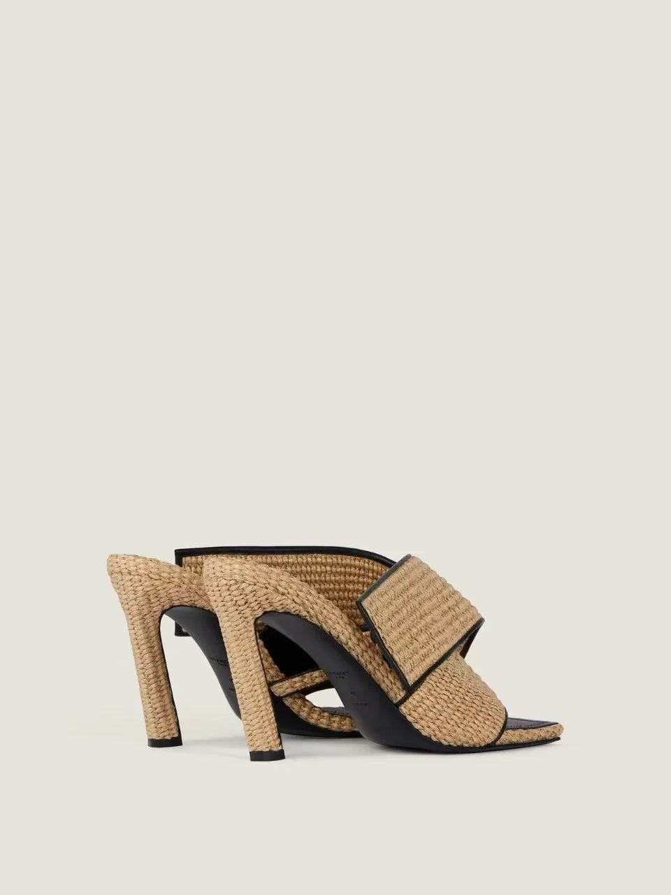 Pair of woven square toe heeled slippers