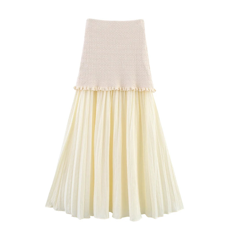 Two-tone skirt with beige top and pleated cream skirt on a white background