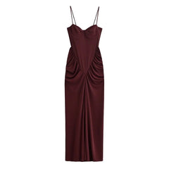 Maroon evening gown with thin straps on a white background
