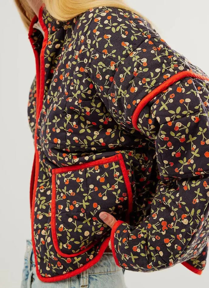 Floral quilted cropped jacket with red piping