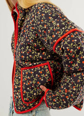 Floral quilted cropped jacket with red piping