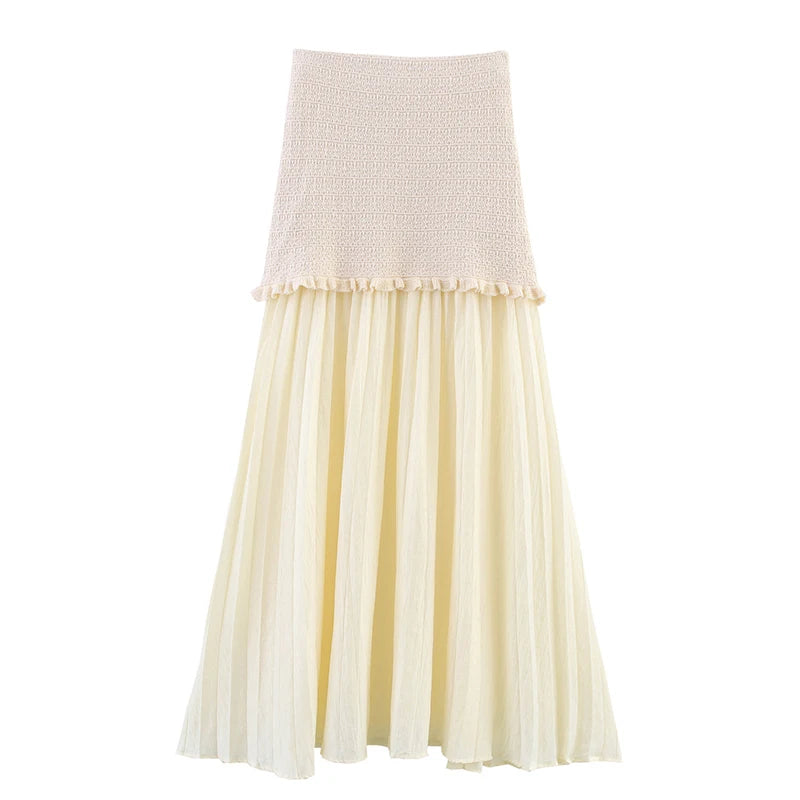 Two-tone skirt with knitted top and sheer skirt on a white background