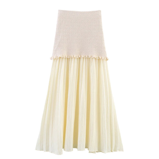 Two-tone skirt with knitted top and sheer skirt on a white background