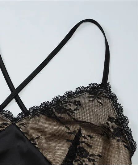 Black lace lingerie set on a light gray background