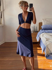 Deep V-neck crop top and midi skirt
