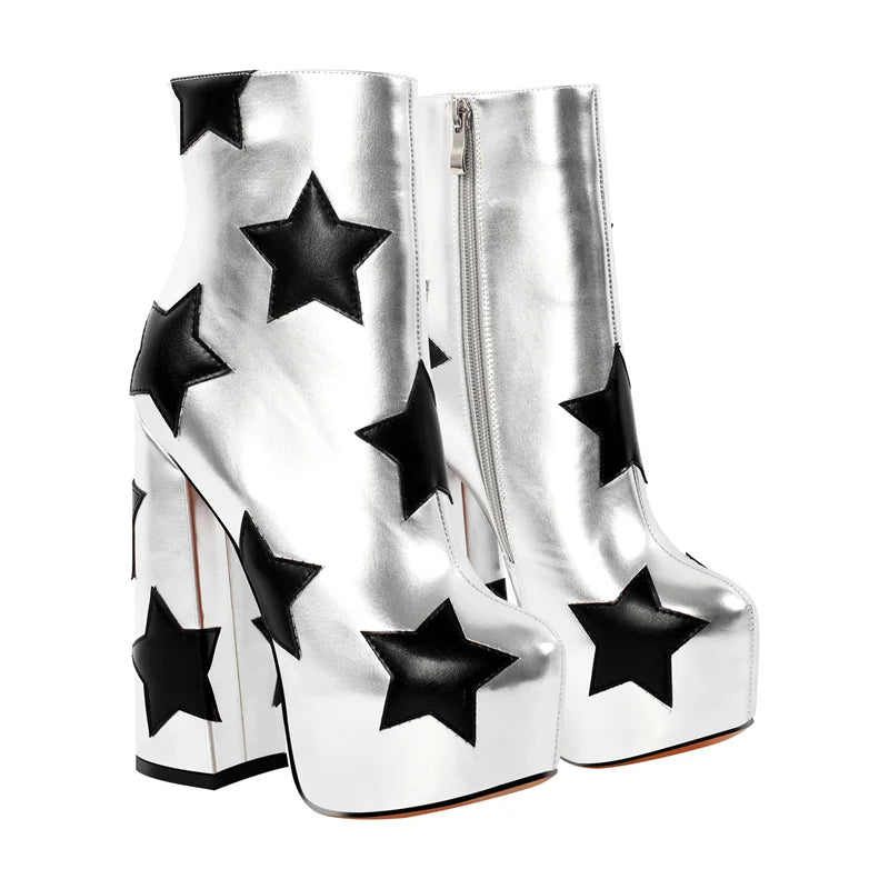 Silver platform boots with black star patterns on a white background