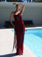 Strapless fringed maxi dress by pool