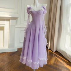 Off-shoulder gauze A-line midi dress with lace trim and chiffon sleeves.