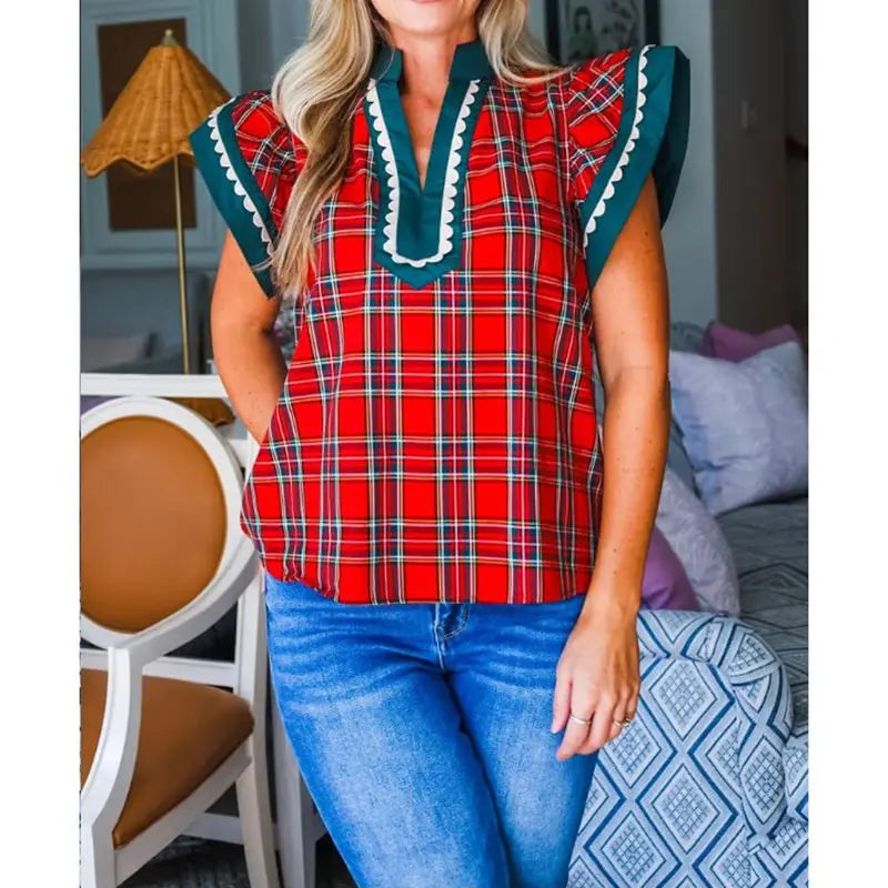 Plaid V-neck top with ruffle sleeves and scalloped trim