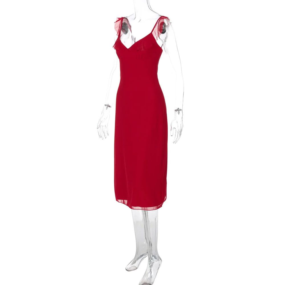 Red dress on a mannequin against a white background