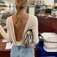 Open back boat neck long sleeve top