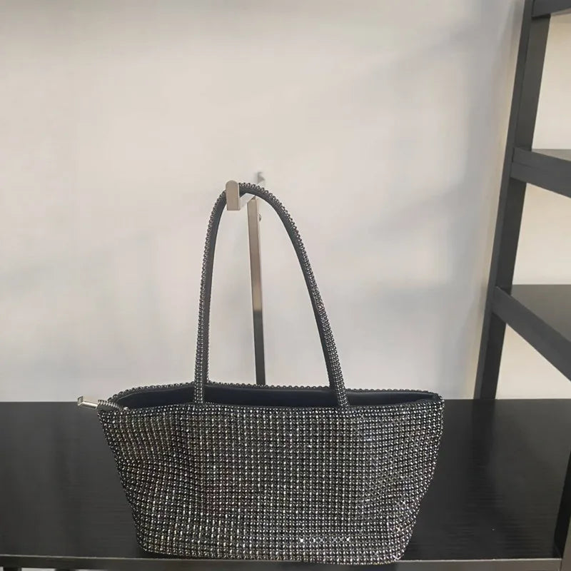 Black crystal-embellished tote bag with chain straps