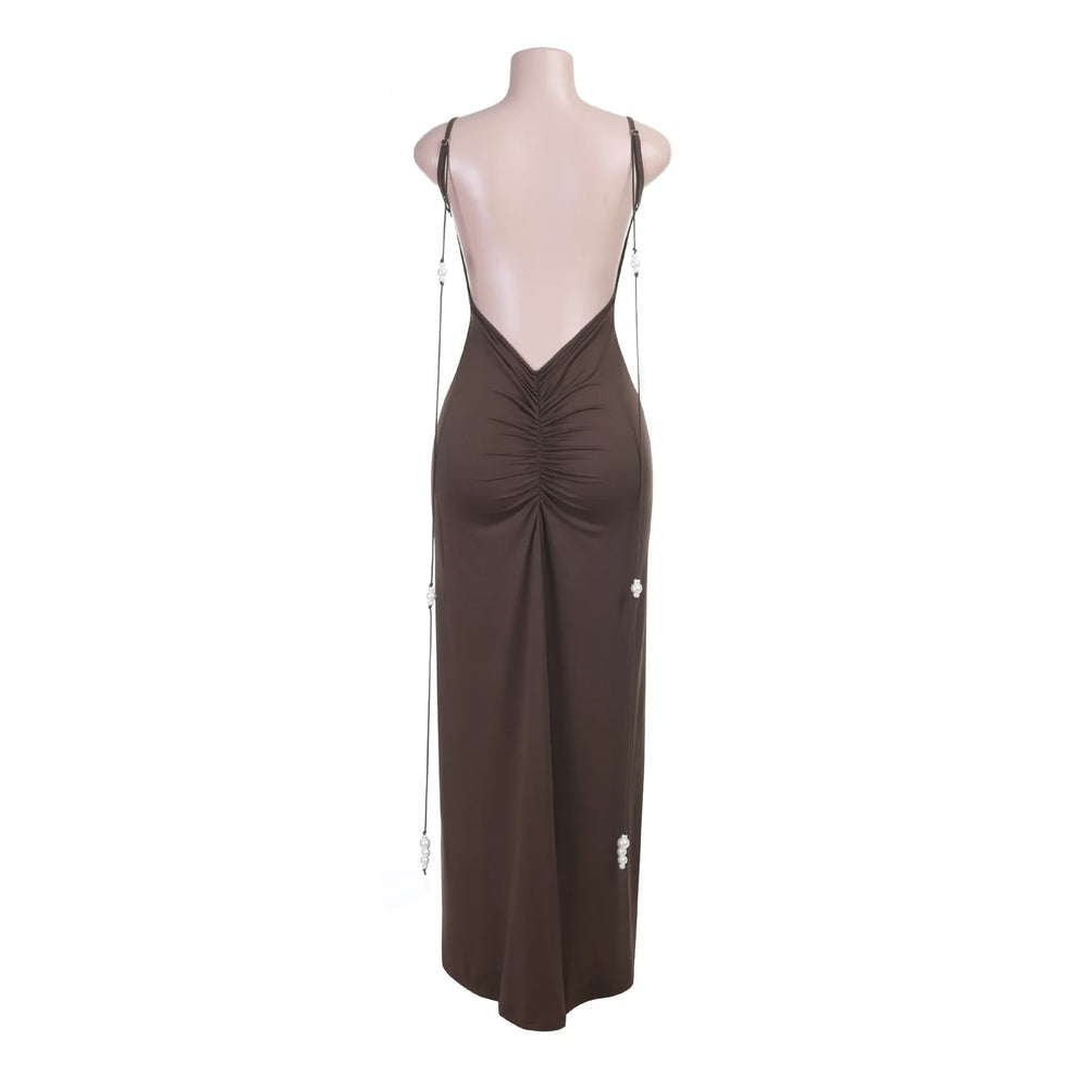 Brown dress on a mannequin with a white background