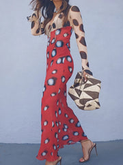 Model holding a woven bag with a tie neck maxi dress.