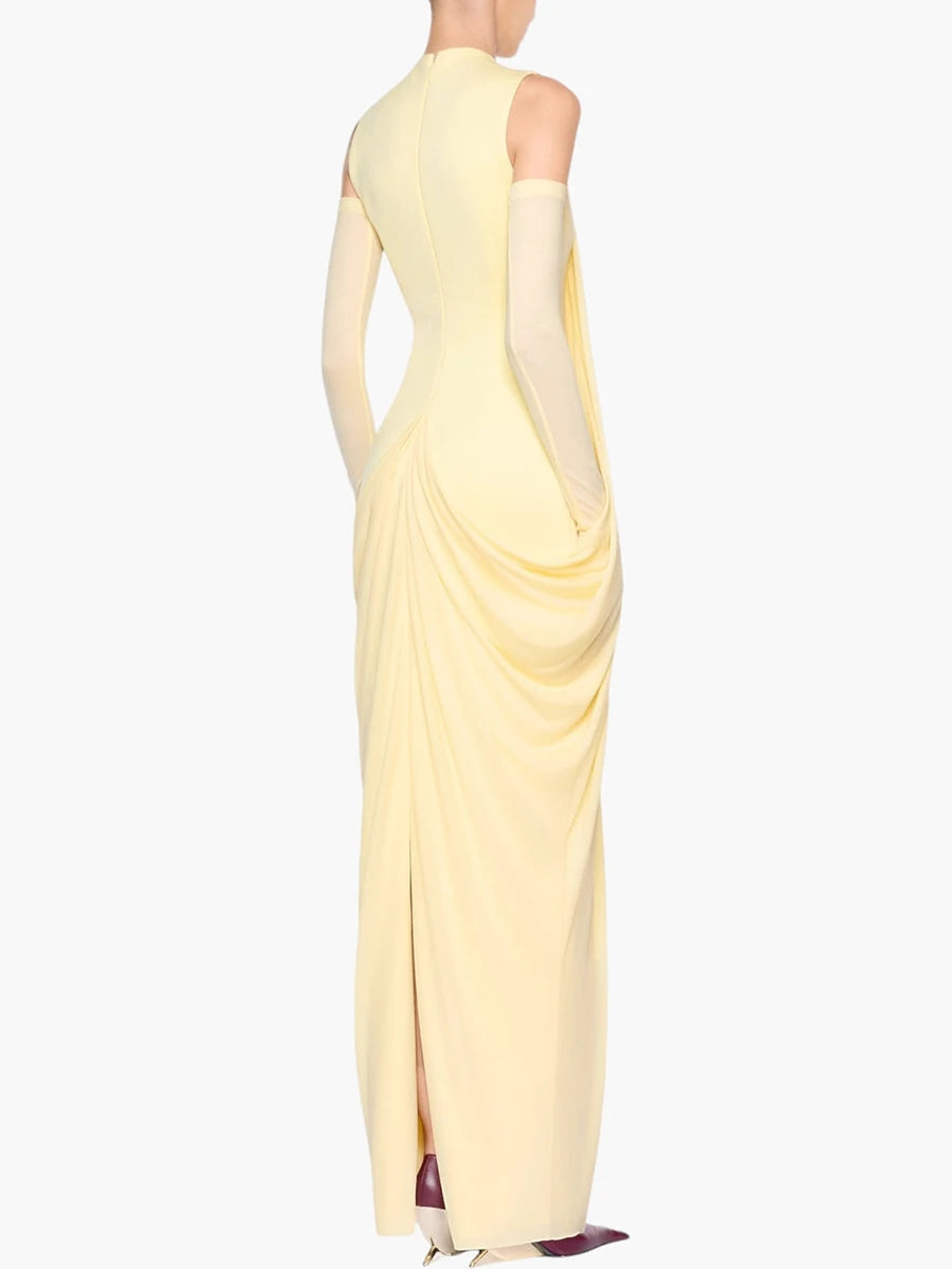 Back view of yellow sleeveless drape maxi dress