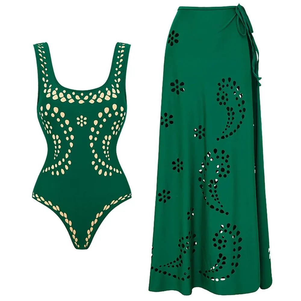Green cut-out embellished one-piece swimsuit and maxi skirt set.