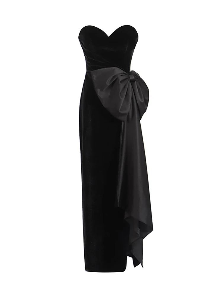 Black strapless gown with a large bow detail on a white background