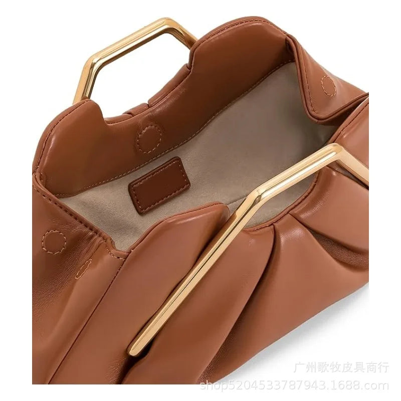 Brown handbag with gold handle 