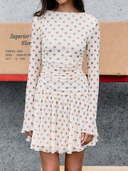 Polka dot ruched mini dress side view