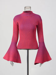 Mannequin wearing a pink ribbed top with flared sleeves on a white background