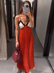 Colorblock chain strap maxi dress with pleated skirt