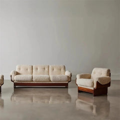 Scandinavian 3-seater accent couch with soft tufted cushions in minimal living room