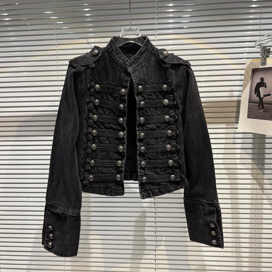 Front view of a black denim jacket with a stand-up collar and double-breasted button closure.
