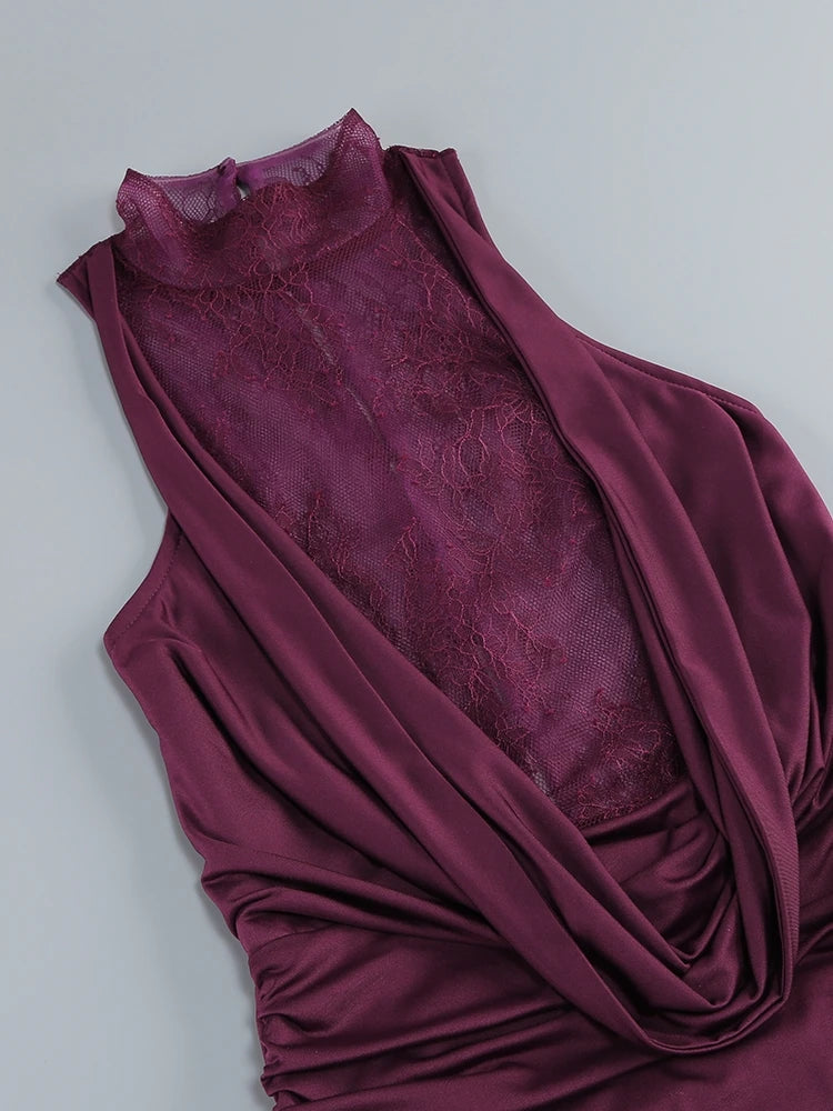 Maroon sleeveless dress with lace detailing on a light gray background