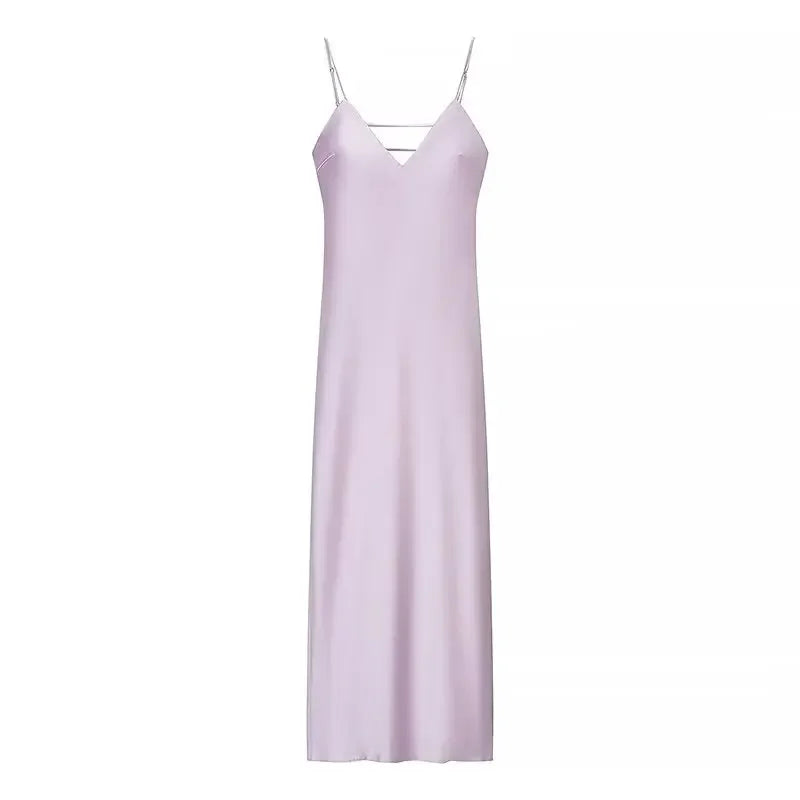 Lavender slip dress on a white background