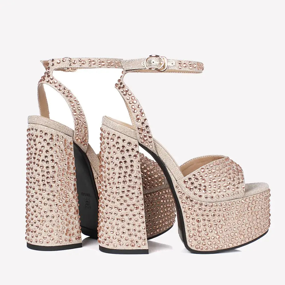 Pair of champagne crystal embellished platform high heel sandals
