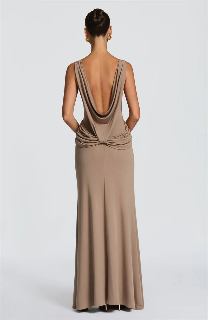 Back view of sleeveless high slit column gown in khaki