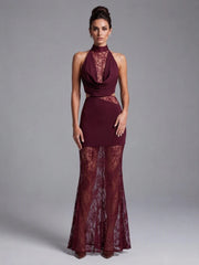 Detail shot of the lace overlay on a halter neck maxi dress.