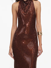 Close-up of halter neck sequin maxi dress bodice