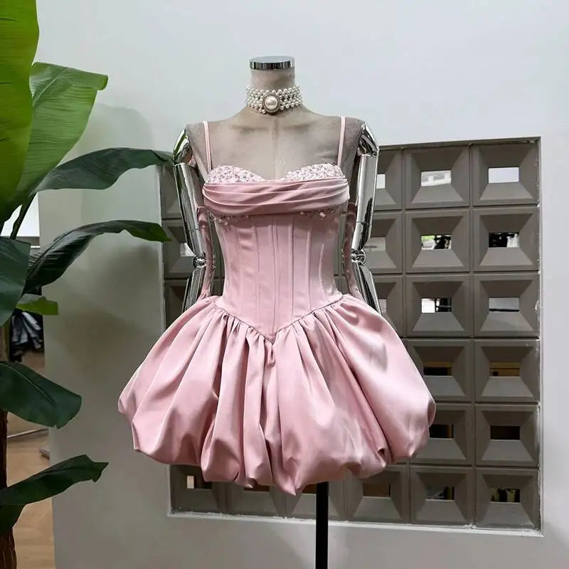 Pink sparkle strapless mini dress