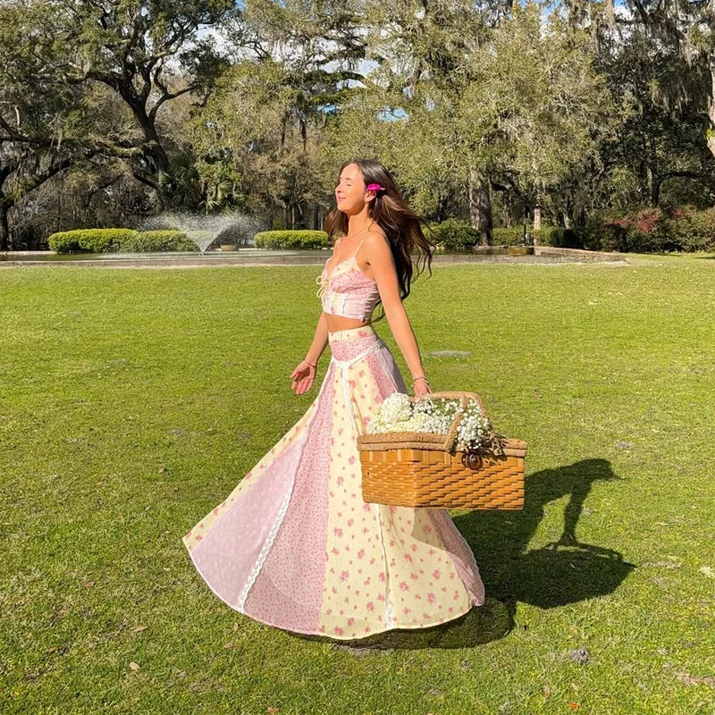 Patchwork lace trimmed crop top and flowing maxi skirt set worn outdoors