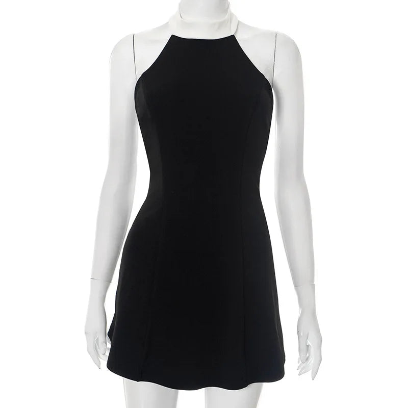 Black dress on a mannequin against a white background