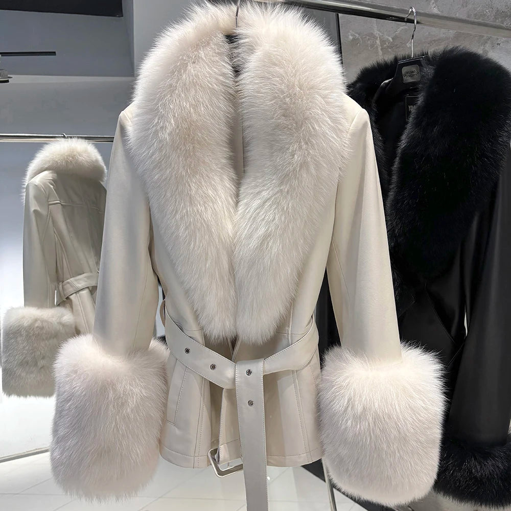 White fur coat with a belt on a rack in a store setting