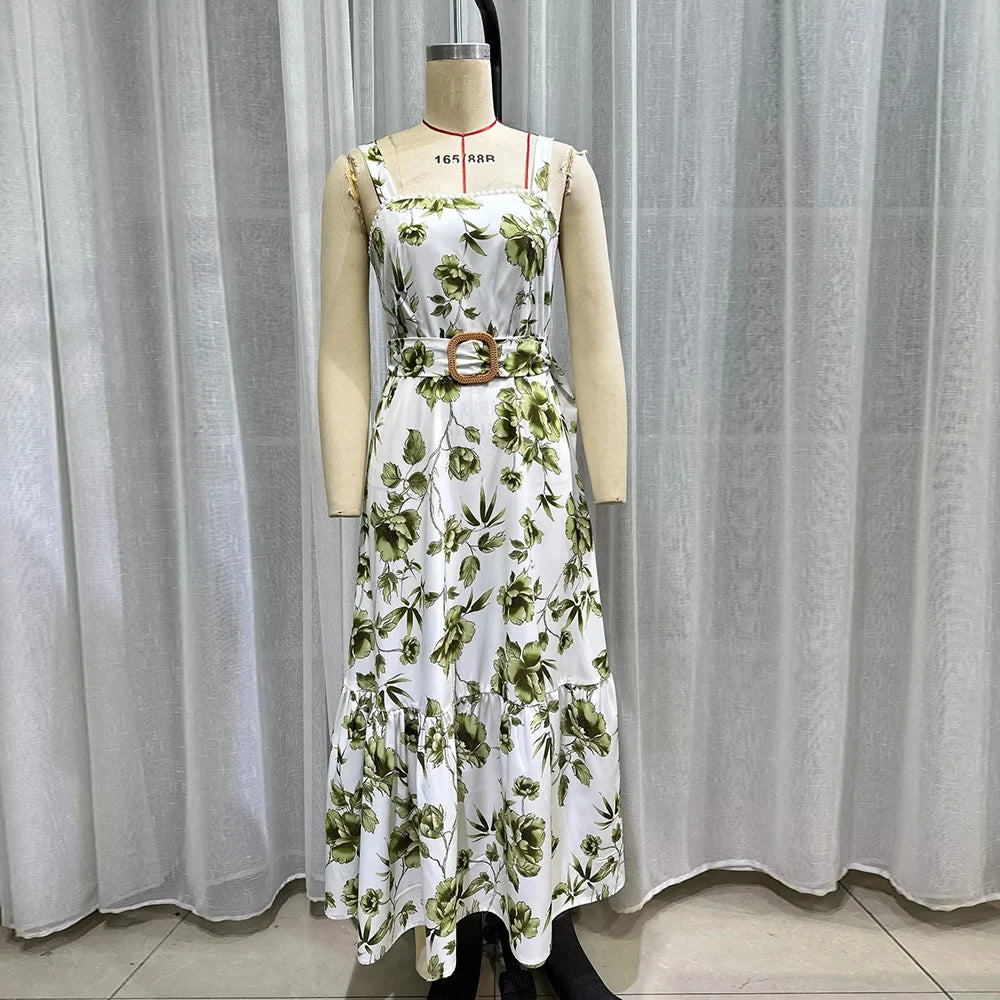 Floral dress on a mannequin against a plain background