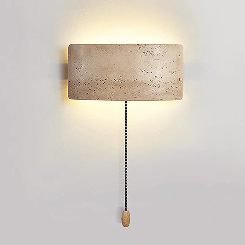 Rectangular wall light fixture with a pull chain on a plain background