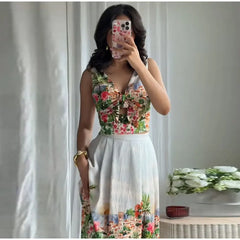 Close-up of the floral print V-neck sleeveless crop top with a tie detail.