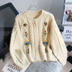 Women's thickened crochet knit cardigan for cozy winter wear.