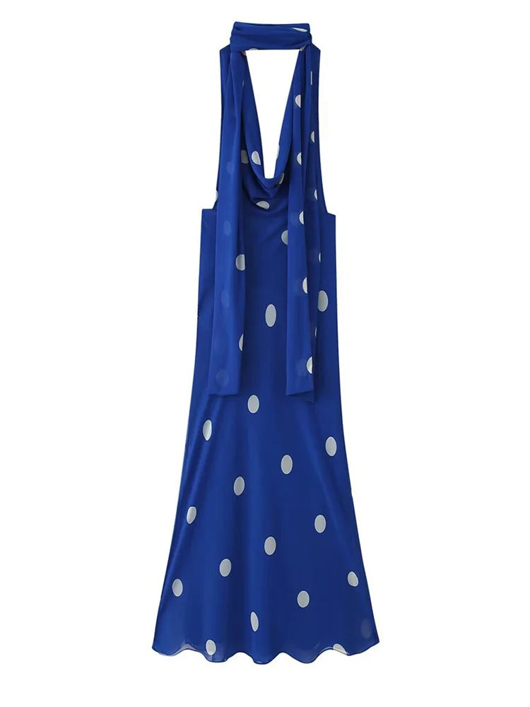 Blue dress with white polka dots on a white background