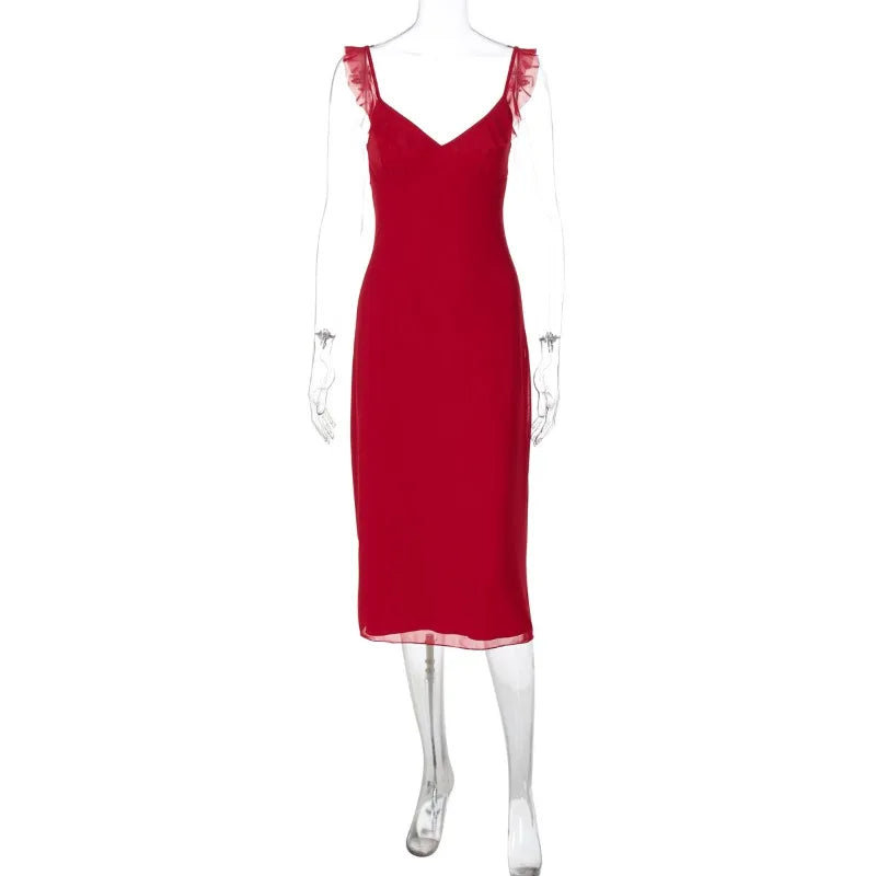 Red dress on a mannequin against a white background