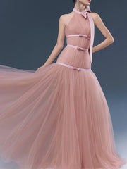 Pink halter bow tulle maxi dress dynamic side view