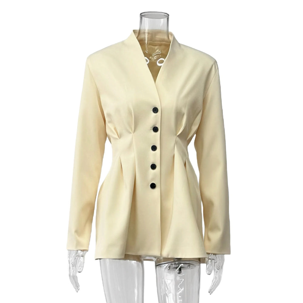 Beige blazer on a mannequin with a white background